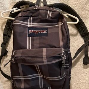 JanSport Black and Gray Plaid Backpack